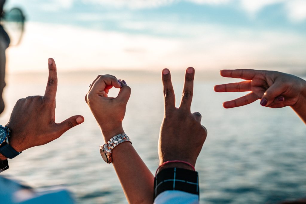 hands spelling the word love